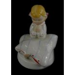 A Royal Dux porcelain figure of a praying child, circular printed mark to underside and pink triangl