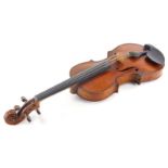A late 19th/early 20thC violin, with ebonised stringing, the back in highly figured burr maple, no l