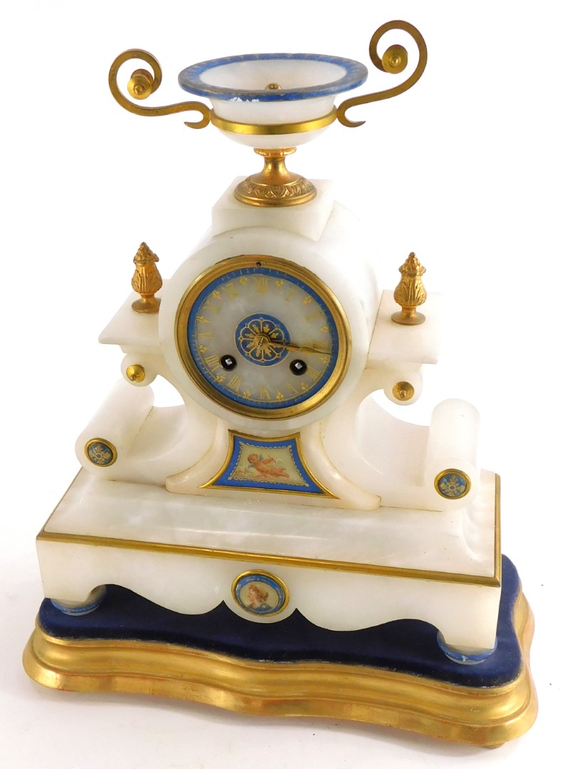 A late 19thC continental alabaster mantel clock, with an urn shaped two handled crest, the dial with