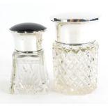 Two 20thC silver topped dressing table bottles, one with a silver and simulated tortoiseshell lid an