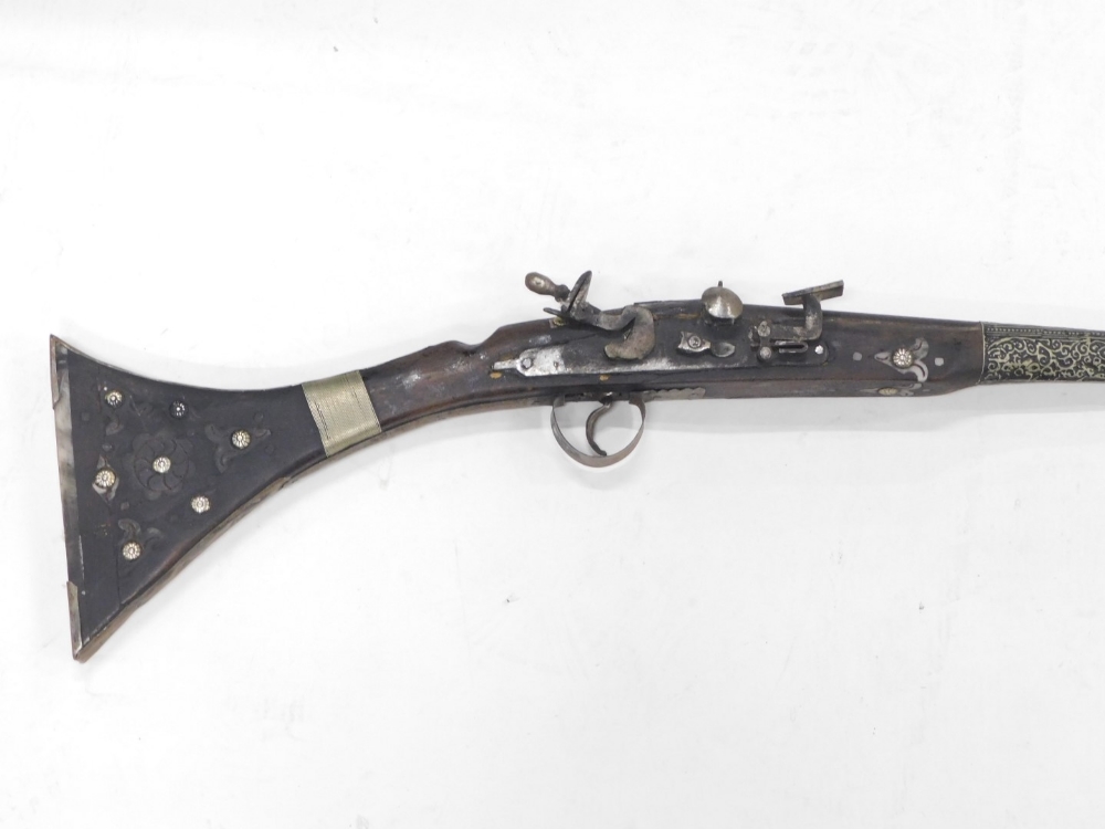 A Middle Eastern rifle, with silver coloured metal bands, etc., 141cm long. - Image 2 of 4