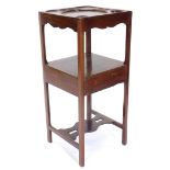A 19thC mahogany washstand, the square top with a recess for a bowl, beakers, etc., on plain support