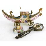 A continental enamel model of a gondola on wheels, with gilt metal mounts, 10cm wide, a similar mand