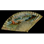 A 19thC continental fan, painted with figures within a landscape, a musician, etc, within a floral b