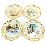 A set of four Coalport winter scene plates, limited editions.
