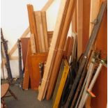 A quantity of furniture restoration items, to include stained pine doors, sections of pine possibly