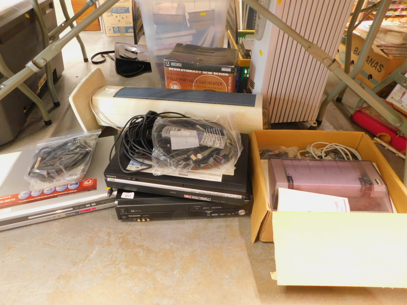 A quantity of DVD players, to include Sony, an oil filled radiator, tower heater, etc. (contents of