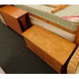 A mid 20thC G-Plan teak drop leaf table, and a pine blanket box, 46cm high, 92cm wide, 40cm deep.