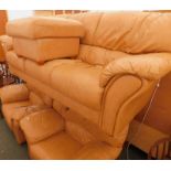 A leather three seater sofa, two armchairs and a footstool. The upholstery in this lot does not comp