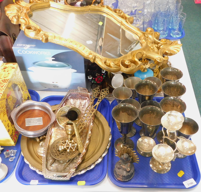 A quantity of plated goblets, brass tray, eastern style Buddha figure, wine coaster, gilt framed orn