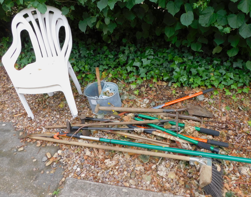 A quantity of garden tools, to include rake, spades, brushes, galvanised metal mop bucket, etc. (a q