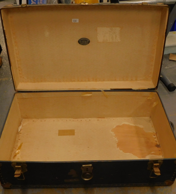 A travelling trunk, with metal mounts.