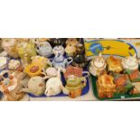 A large quantity of teapots, to include Cottage ware, novelty character type jug, Oriental style tea