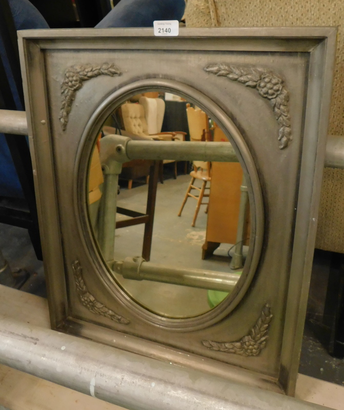 A wall mirror, painted in grey, with moulded flower and leaf decoration, the frame 64cm x 50cm.