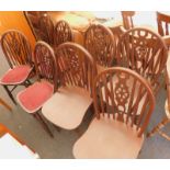 A set of eight Andy Thornton wheelback pub type chairs.