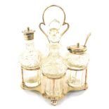 A silver plated cruet stand, with four cut crystal bottles.