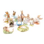 A selection of Beatrix Potter figures by Royal Albert, including Peter With Post Bag, Tom Kitten, Mr