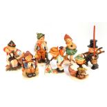 A group of Hummel and Kortzendorf figures, including Chimney Sweep, Off To School, etc. (7)