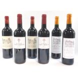 Two bottles of La Font St Martin Bordeaux 2016, two bottles of Chateau Les Rochers Bordeaux 2018, an