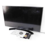 A LG 43" LCD television, Model No 43UH661V, with power lead, remote and instructions.