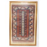 A Persian type rug, with a geometric striped design in blue, cream and burnt orange, with one wide a