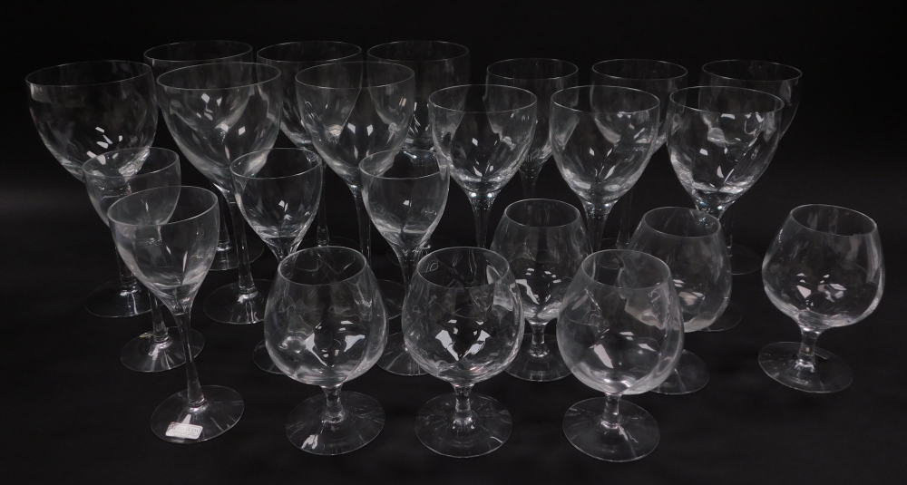 A part suite of Kosta Boda Swedish table glass ware, comprising six red and six white wine glasses,