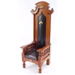 A Masonic light oak model of a Doric highchair, with leatherette seat and back, plaque named to H J