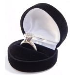 A diamond solitaire ring, high claw set in white metal, stamped 14k, approximately 2cts, size J/k, 4