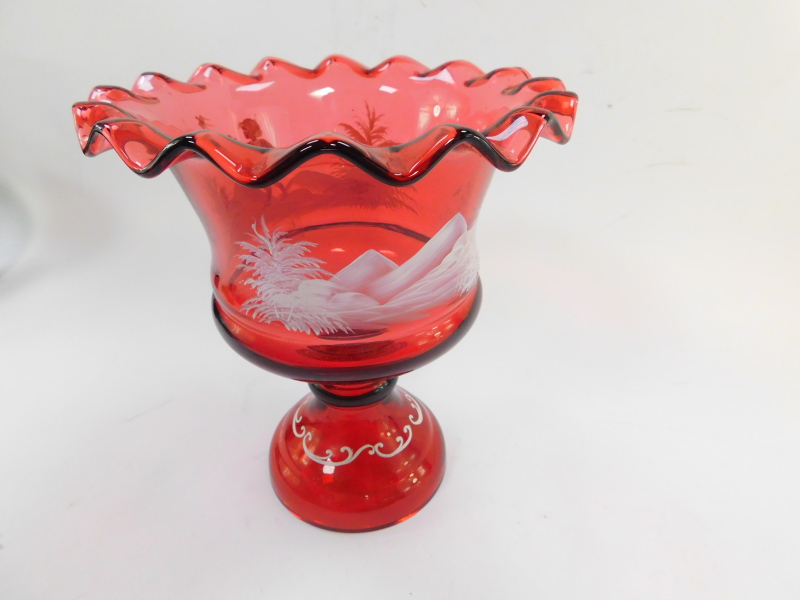 A Victorian cranberry glass vase, decorated in the Mary Gregory style, having a wavy rim and a band - Image 2 of 2