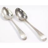 A pair of George III silver tablespoons, with bright cut engraving, shield reserve, monogram engrave