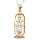 An Egyptian hieroglyph pendant, yellow metal, on a belcher link neck chain, stamped 585, 4.2g all in