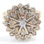 A 9ct gold and diamond flower head ring, in a basket setting, size O/P, 4.1g.