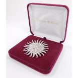 A Camrose & Kross paste sunburst brooch, being a copy of a jewel worn by Jacqueline Bouvier Kennedy,