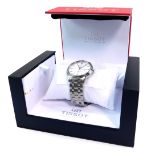 A Tissot gentleman's Automatic III stainless steel cased wrist watch, circular white dial, centre se