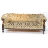 A Victorian Aesthetic movement ebonised and parcel gilt Chesterfield sofa, with a buttoned back, uph