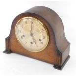 A Smiths mantel clock, with Westminster chime, in oak case, 29cm wide.