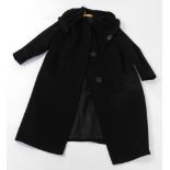 A Miracle lady's full length black coat, with an Astrakan collar.