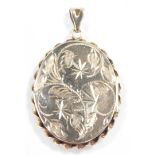 A 9ct gold oval photo locket, foliate engraved, within a ropetwist border, 9.8g.