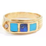 An Egyptian turquoise lapis lazuli and diamond ring, set in an abstract yellow metal shank, size R,