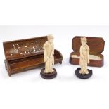 Oriental items, comprising a pair of Japanese carved ivory Okimono, a bronze metal box with pierced
