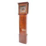 A Continental Beidermeier style walnut clock case, with glazed hood embellished with spirally turned