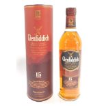 A bottle of Glenfiddich Single Malt Scotch Whisky, 15 years old, boxed.