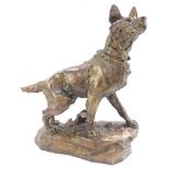 After Thomas Francois Cartier (French, 1879-1943). A bronze metal sculpture of a German Shepherd dog