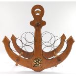 An anchor framed six bottle wine rack, 50cm high.