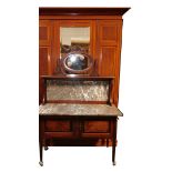 A late Victorian wardrobe, with moulded edge above a central mirror door, flanked by paneled sides,