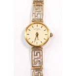 A Rotary lady's quartz wristwatch, in 9ct gold case, with a 9ct pierced strap, 11.9 grams all in.