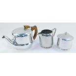 A Picquot ware three piece tea set, comprising teapot, cream jug and sucrier.