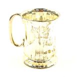 A George V silver christening tankard, of baluster form, with vertical fluting, base presentation en