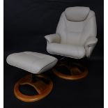 A modern cream leather armchair, on a bentwood base, and a matching stool.