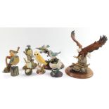 A Country Artists figure of a bald eagle landing, model CA590, 22cm high., a pair of blue tits with